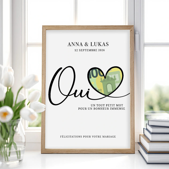 Affiche cagnotte de mariage « Oui » avec cœur en billet dans un cadre en bois près d’une fenêtre, market_france