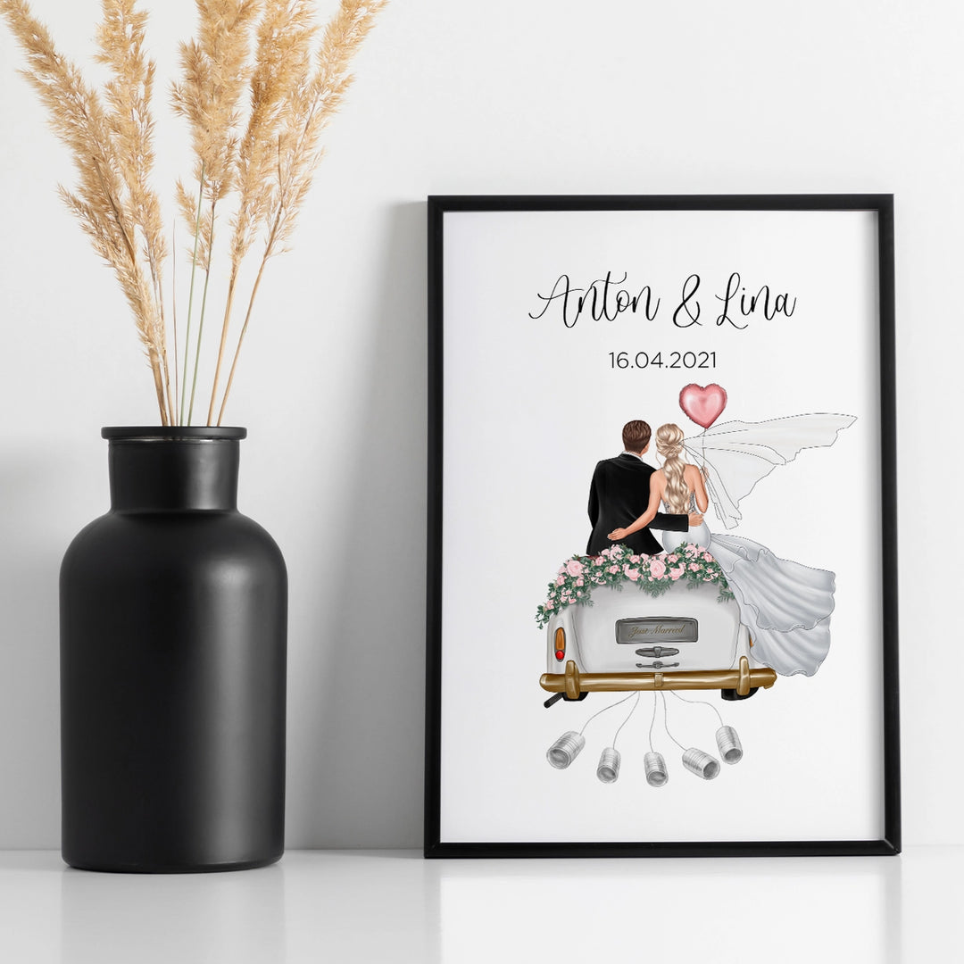 Personalisiertes Hochzeitsposter "Just Married" mit Brautpaar-Illustration und Datum, gerahmt neben schwarzer Vase mit Pampasgras, als individuelles Geldgeschenk für Anton und Lina